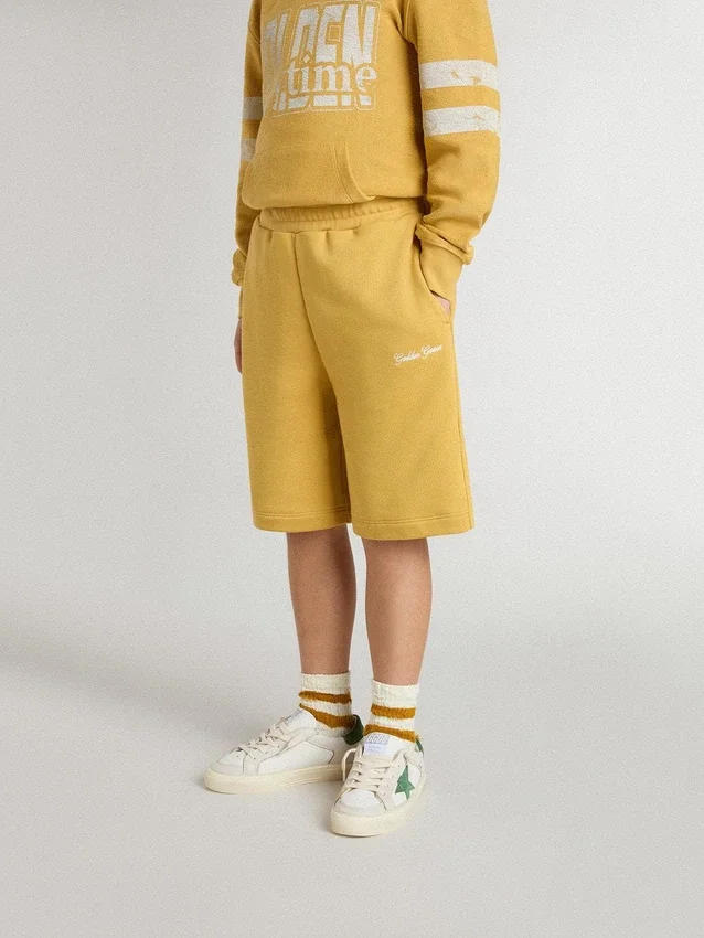Pantaloncini da jogging per bambini in giallo ocra con ricami
