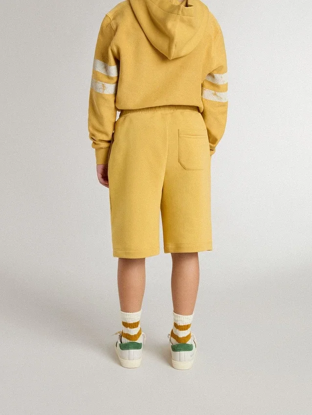 Pantaloncini da jogging per bambini in giallo ocra con ricami