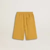 Pantaloncini da jogging per bambini in giallo ocra con ricami