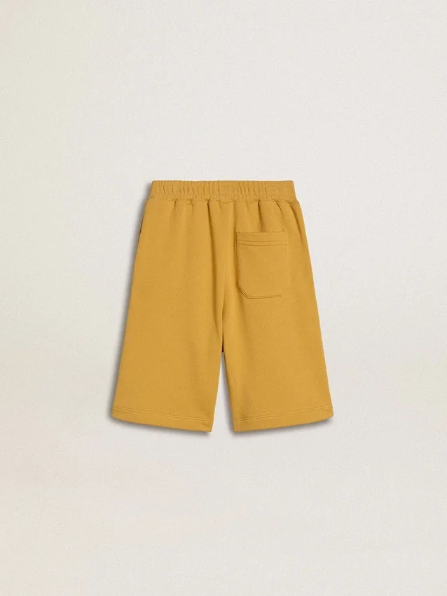 Pantaloncini da jogging per bambini in giallo ocra con ricami