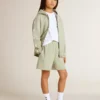 Pantaloncini verde chiaro con stella bianca