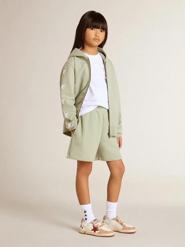 Pantaloncini verde chiaro con stella bianca