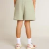 Pantaloncini verde chiaro con stella bianca