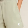 Pantaloncini verde chiaro con stella bianca