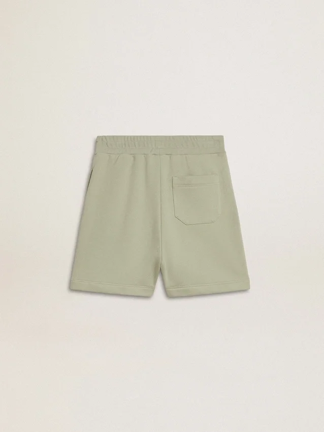 Pantaloncini verde chiaro con stella bianca
