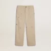 Pantaloni chino da bambino beige con tocchi multicolori