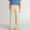 Pantaloni chino da bambino beige con tocchi multicolori