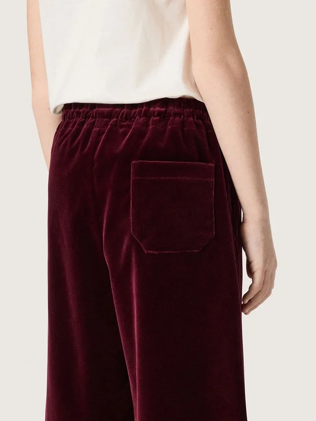 Pantaloni da bambina color bordeaux effetto velluto con tasca posteriore