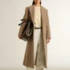 Pantaloni da donna in denim bianco con perline e cristalli