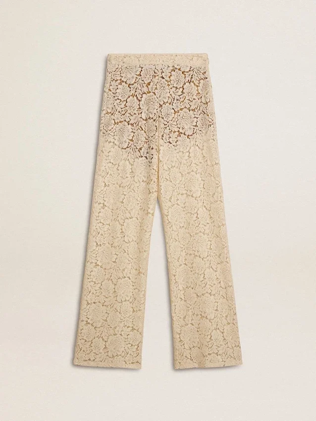Pantaloni da donna in pizzo trasparente color crema