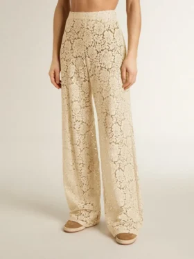 Pantaloni da donna in pizzo trasparente color crema