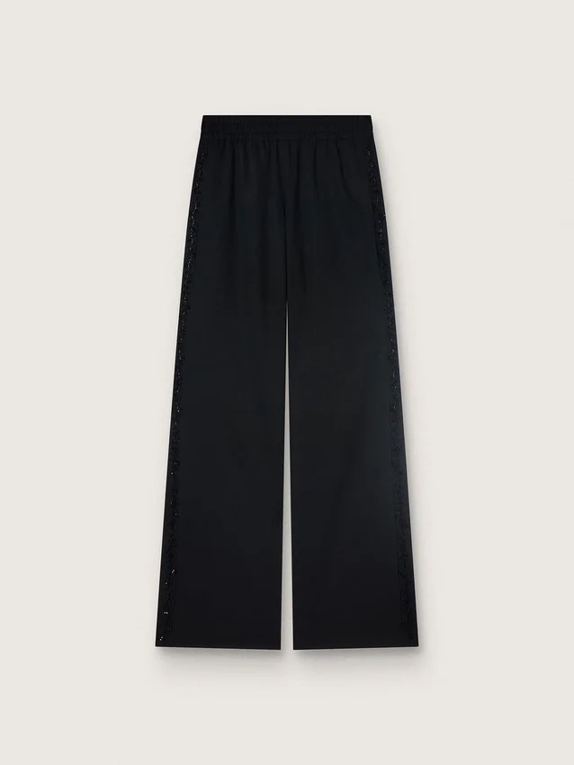 Pantaloni da donna in twill di lana nero con ricami di paillettes