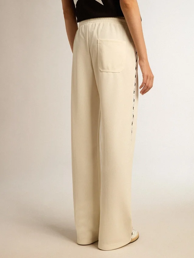 Pantaloni da jogging da donna bianchi con stelle sui lati