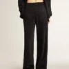 Pantaloni da jogging da donna neri con stampa toile de jouy tono su tono