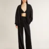 Pantaloni da jogging da donna neri con stampa toile de jouy tono su tono