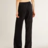 Pantaloni da jogging da donna neri con stampa toile de jouy tono su tono