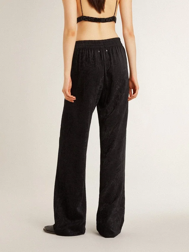 Pantaloni da jogging da donna neri con stampa toile de jouy tono su tono