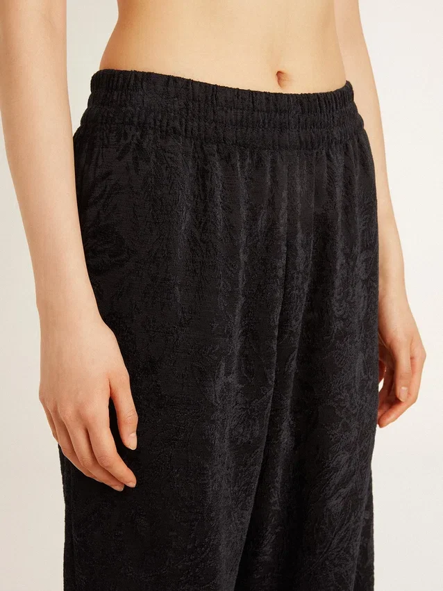 Pantaloni da jogging da donna neri con stampa toile de jouy tono su tono