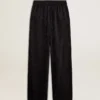 Pantaloni da jogging da donna neri con stampa toile de jouy tono su tono