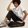 Pantaloni da jogging da donna neri con stelle bianche sui lati