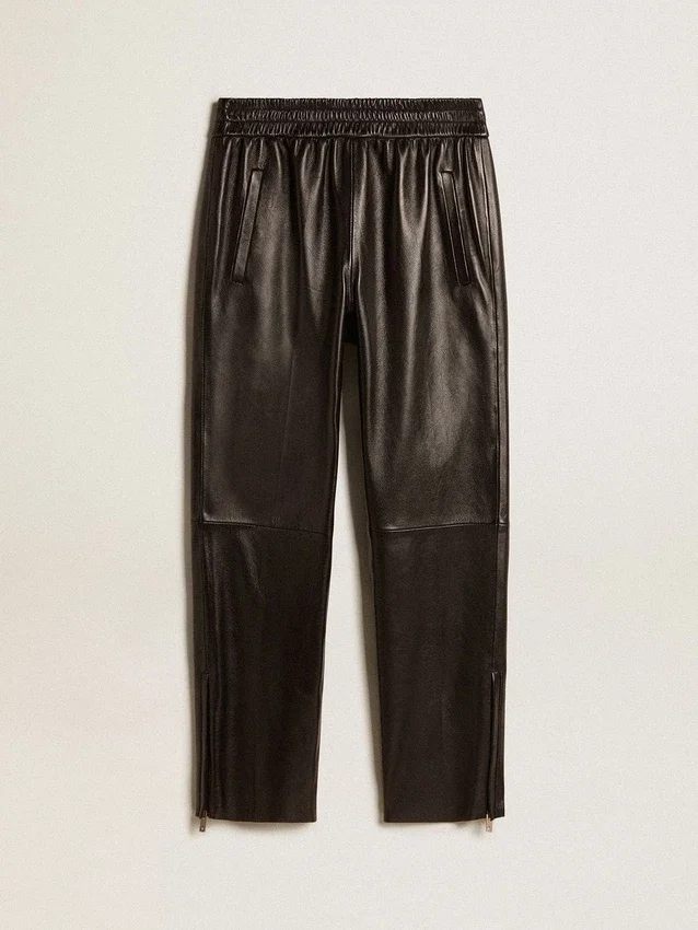 Pantaloni da jogging neri in pelle nappa con cerniera sul fondo