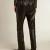 Pantaloni da jogging neri in pelle nappa con cerniera sul fondo
