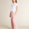 Pantaloni da jogging rosa con stella glitterata sul davanti