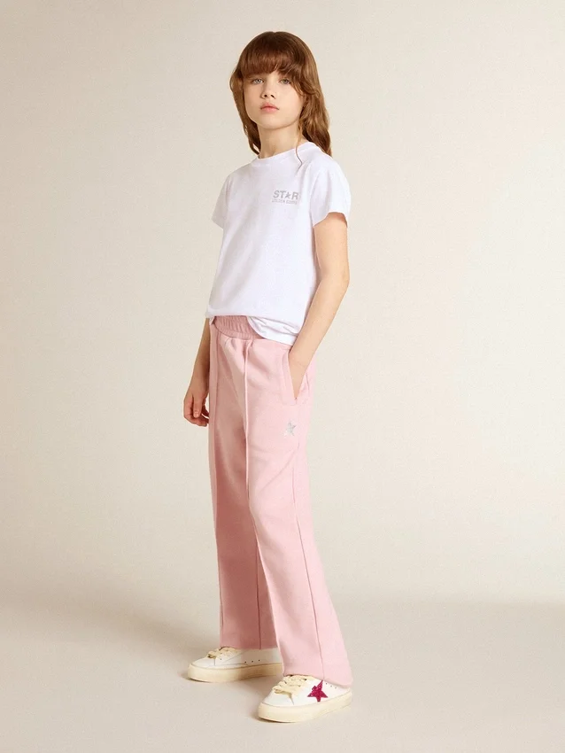 Pantaloni da jogging rosa con stella glitterata sul davanti