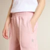 Pantaloni da jogging rosa con stella glitterata sul davanti