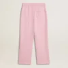 Pantaloni da jogging rosa con stella glitterata sul davanti