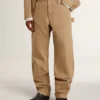 Pantaloni da uomo beige con toppe