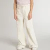 Pantaloni larghi a costine color crema per bambine con ricami