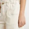 Pantaloni larghi a costine color crema per bambine con ricami
