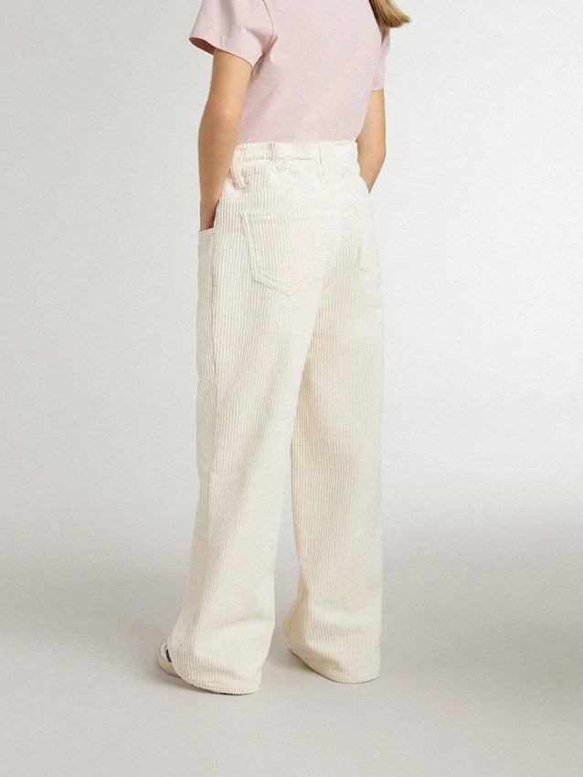 Pantaloni larghi a costine color crema per bambine con ricami