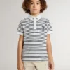 Polo da bambino in cotone bianco con strisce blu navy e ricamo