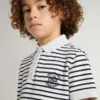 Polo da bambino in cotone bianco con strisce blu navy e ricamo
