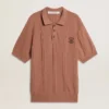 Polo da uomo color mattone con logo ricamato.