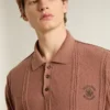 Polo da uomo color mattone con logo ricamato.