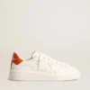 Purestar da donna con stella in pelle bianca e linguetta sul tallone arancione