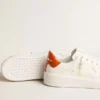 Purestar da donna con stella in pelle bianca e linguetta sul tallone arancione