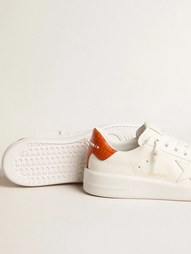 Purestar da donna con stella in pelle bianca e linguetta sul tallone arancione