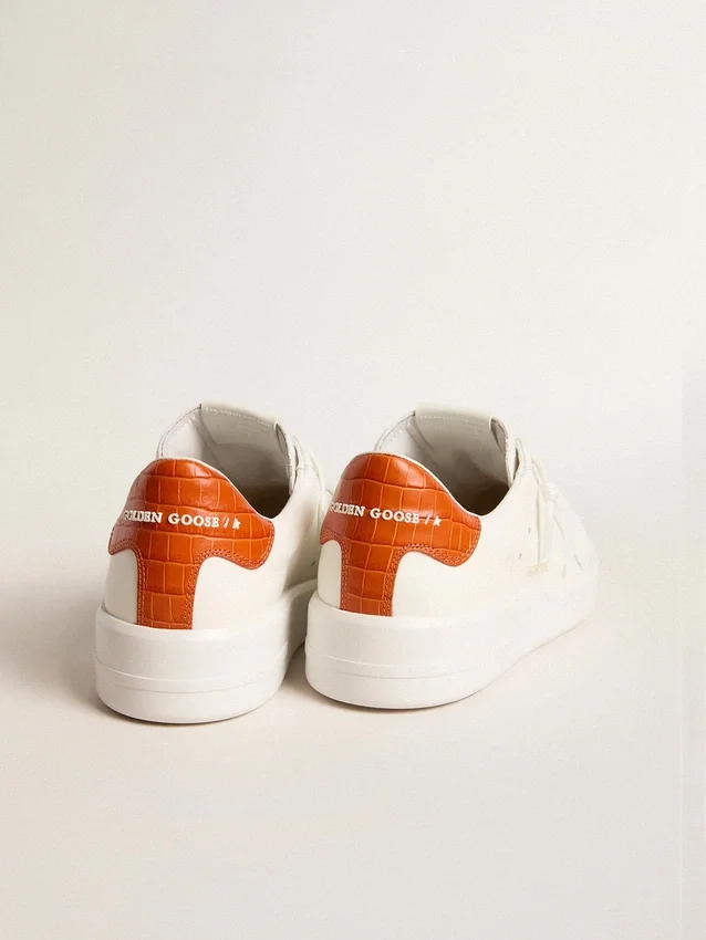 Purestar da donna con stella in pelle bianca e linguetta sul tallone arancione