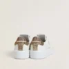 Purestar da donna con stella in pelle bianca e linguetta sul tallone con cristalli marroni