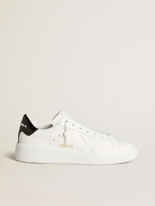 Purestar da donna con stella in pelle e linguetta sul tallone in vernice nera