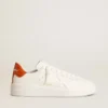 Purestar da uomo con stella in pelle bianca e linguetta sul tallone arancione