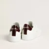 Purestar da uomo con stella in pelle bianca e linguetta sul tallone in pelle bordeaux con stampa coccodrillo
