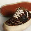 Sabot Space-Star da donna in pelle di pony con stampa leopardata e stella nera