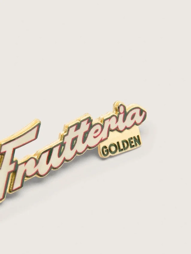 Set di due spille “Frutteria Golden”