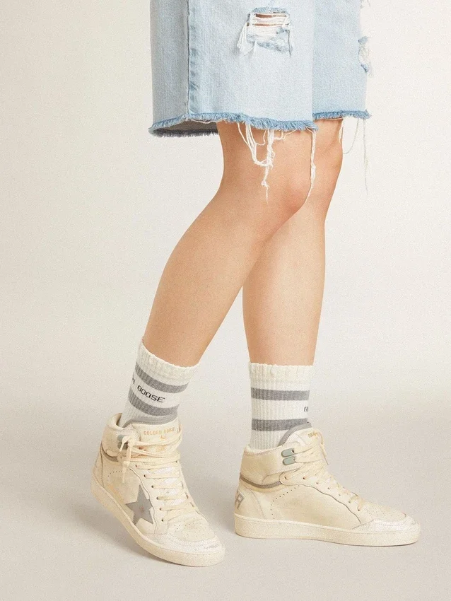 Sky-Star da donna in pelle con stella in pelle azzurra e linguetta sul tallone bianca