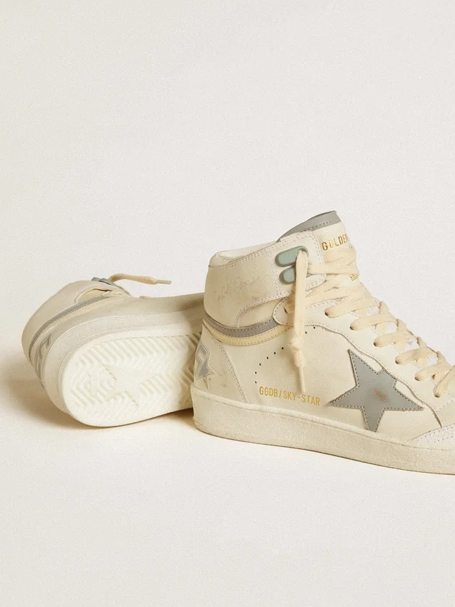 Sky-Star da donna in pelle con stella in pelle azzurra e linguetta sul tallone bianca